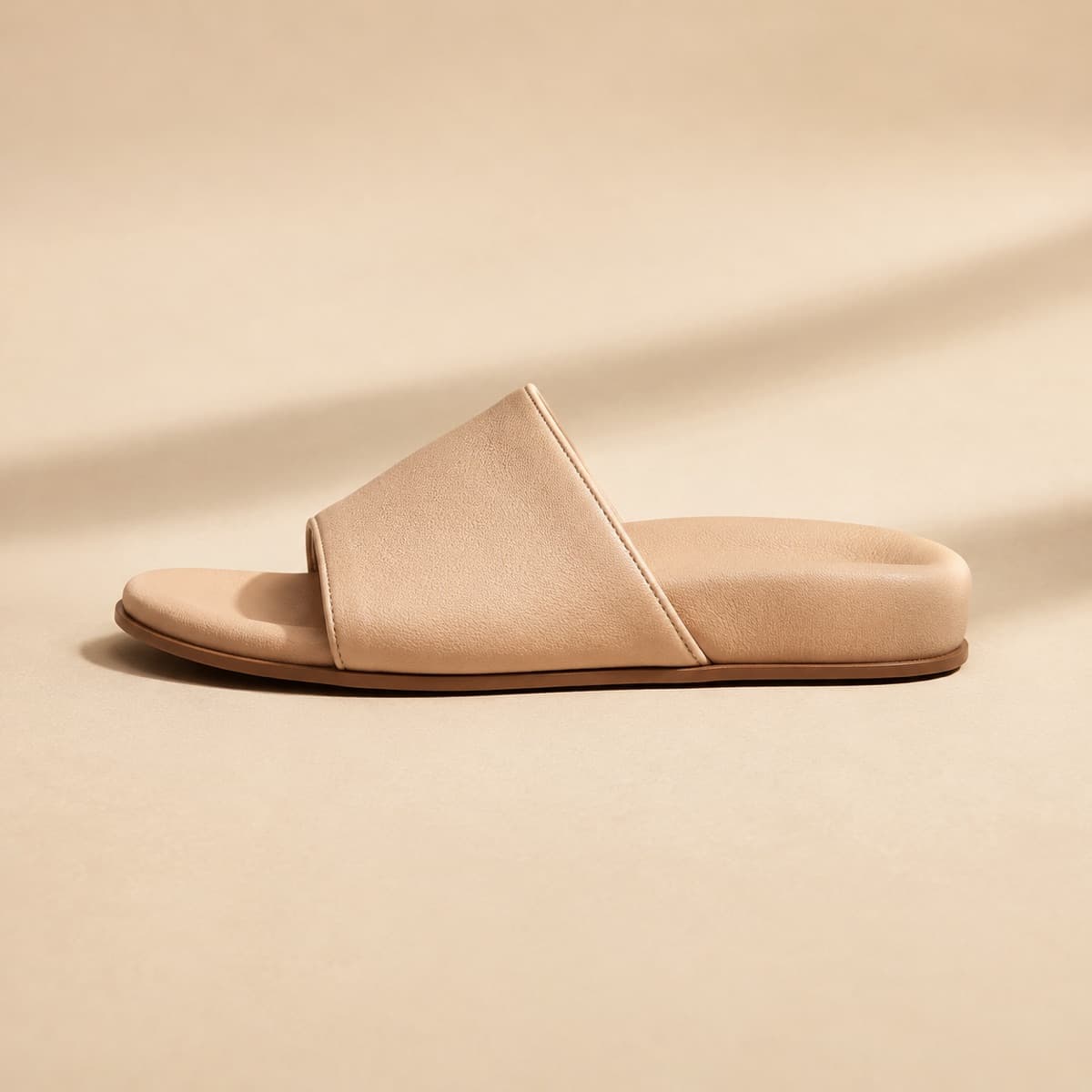 Mule Padded Bed, photographed from above against a sand-beige background