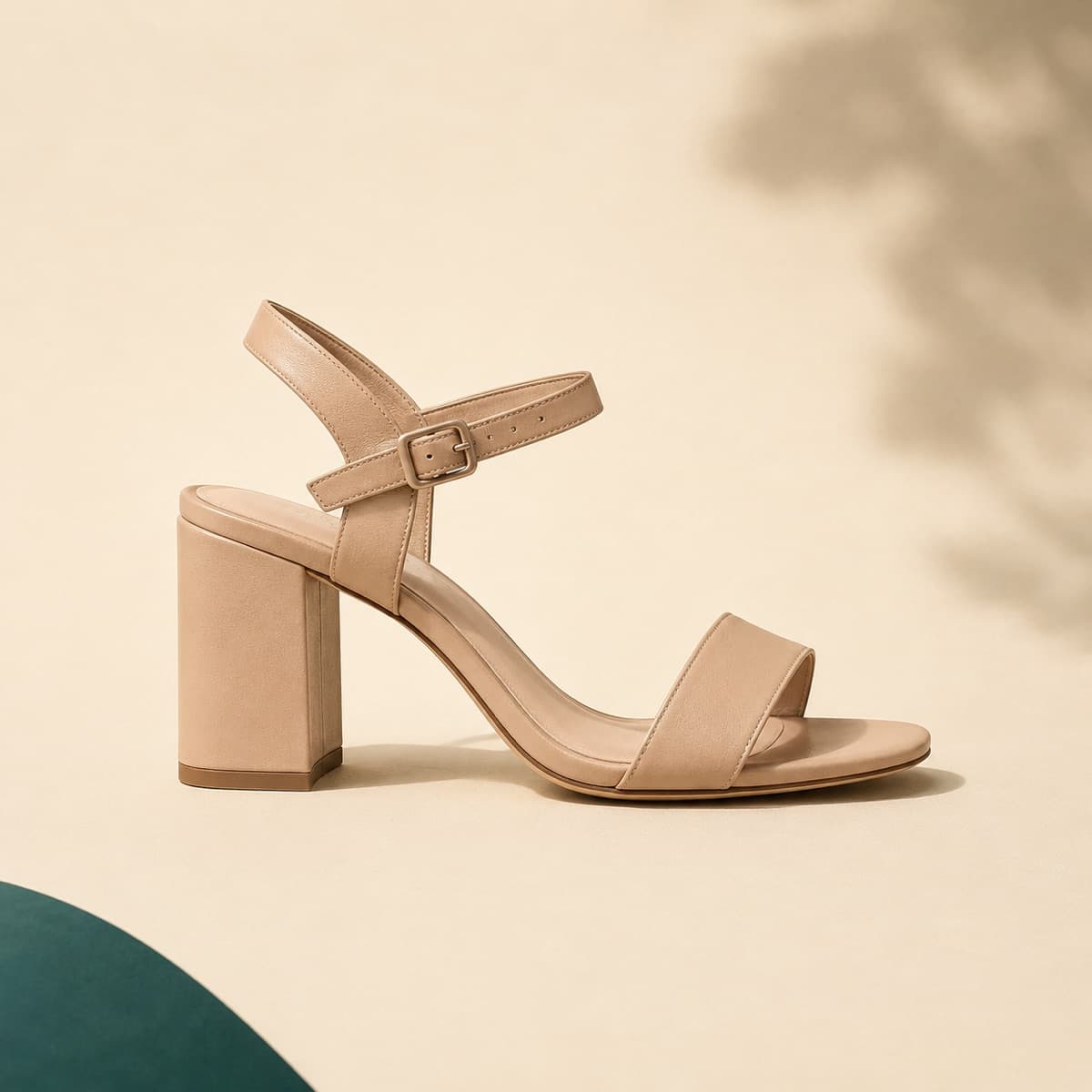 Block Heel 50 mm, photographed from above against a sand-beige background
